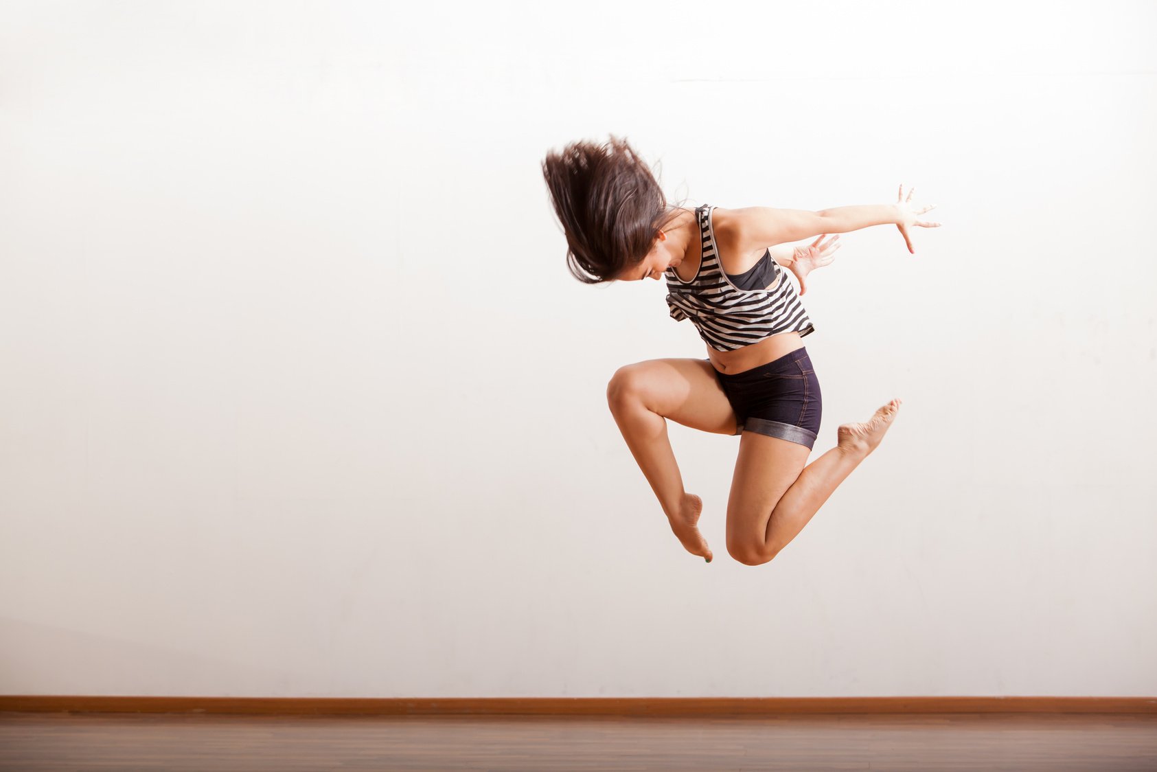 Jazz dancer performing a jump